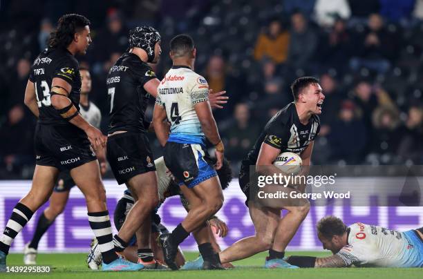 Joseph Manu of New Zealand celebrates their sides third try during the Rugby League World Cup Quarter Final match between New Zealand and Fiji at MKM...