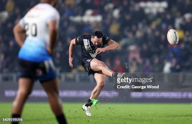 Jordan Rapana of New Zealand kicks a penalty during the Rugby League World Cup Quarter Final match between New Zealand and Fiji at MKM Stadium on...