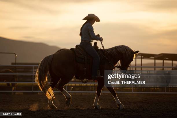 young cowgirl riding at rodeo arena - farm girl clothes stock pictures, royalty-free photos & images