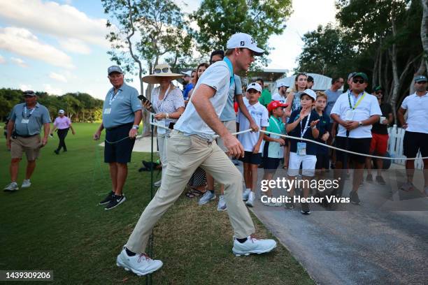 Russell Henley of United States leaves the course after completing the third round of the World Wide Technology Championship at Club de Golf El...