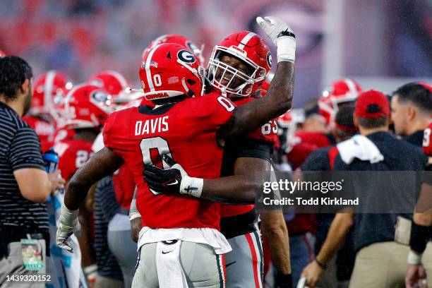 Rian Davis and Sedrick Van Pran of the Georgia Bulldogs react after a play against the Tennessee Volunteers during the fourth quarter at Sanford...