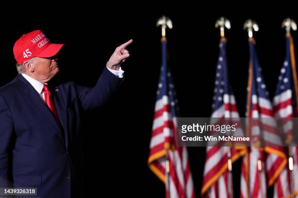 Former U.S. President Donald Trump speaks arrives on stage at a rally at the Arnold Palmer Regional Airport November 5, 2022 in Latrobe,...