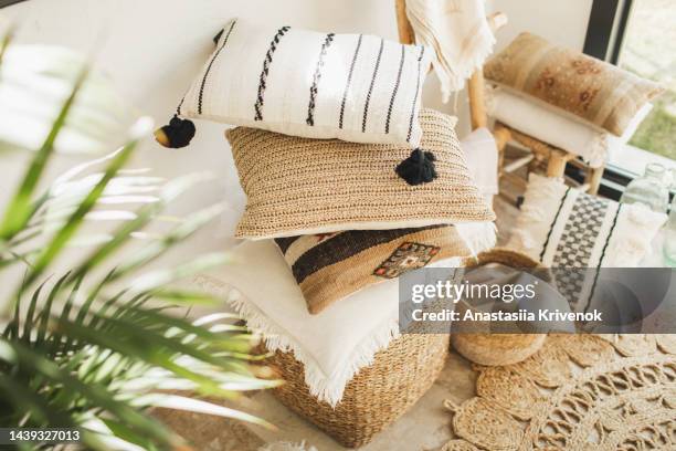 stylish boho interior of living room with elegant accessories. - boho-stil stock-fotos und bilder