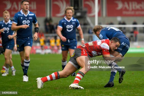 Tom Seabrook of Gloucester Rugby tackles Gus Warr of Sale Sharks during the Gallagher Premiership Rugby match between Sale Sharks and Gloucester...