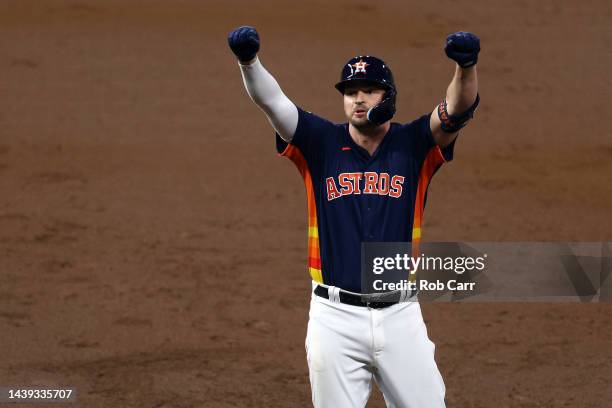 Trey Mancini of the Houston Astros reacts after hitting a single against the Philadelphia Phillies during the third inning in Game Six of the 2022...