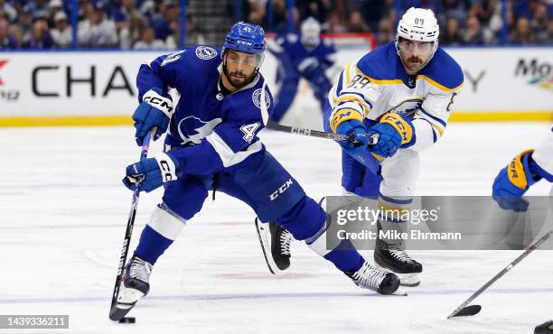 Pierre-Edouard Bellemare of the Tampa Bay Lightning looks to pass during a game against the Buffalo Sabres at Amalie Arena on November 05, 2022 in...