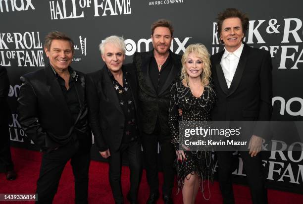 Roger Taylor, Nick Rhodes, John Taylor, Dolly Parton and Simon Le Bon attend the 37th Annual Rock & Roll Hall of Fame Induction Ceremony at Microsoft...