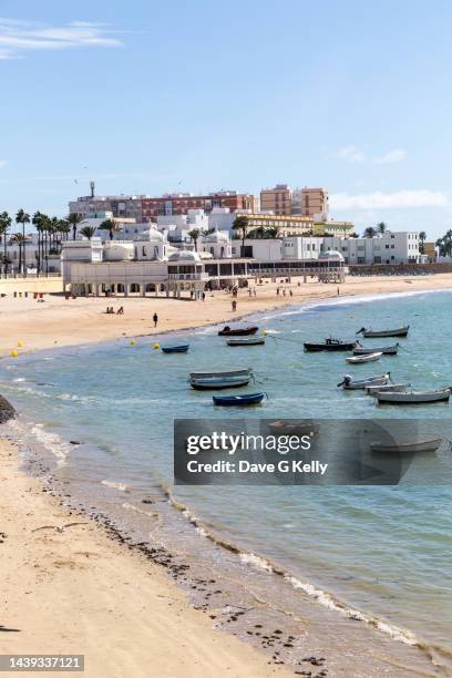 la caleta beach and moored boats, cadiz, spain - playa de la caleta stock pictures, royalty-free photos & images