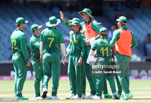 South Africa players celebrate the wicket of Tom Cooper of the Netherlands for 35 runs - Caught Quinton de Kock and bowled Keshav Maharaj during the...