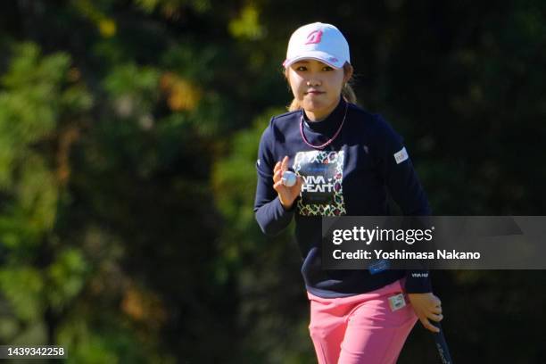 Ayaka Furue of Japan acknowledges the gallery on the 2nd green during the final round of the TOTO Japan Classic at Seta Golf Course North Course on...