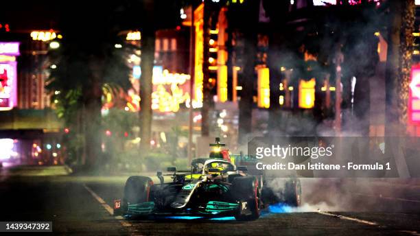 Lewis Hamilton of Great Britain and Mercedes driving on track during the Formula 1 Las Vegas Grand Prix 2023 launch party on November 05, 2022 on the...