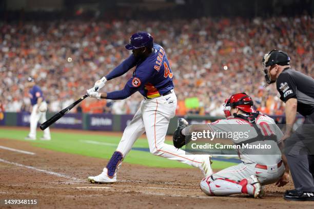 Yordan Alvarez of the Houston Astros hits a three-run home run against the Philadelphia Phillies during the sixth inning in Game Six of the 2022...
