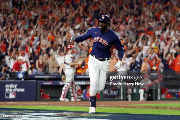 Yordan Alvarez of the Houston Astros hits a three-run home run against the Philadelphia Phillies during the sixth inning in Game Six of the 2022...