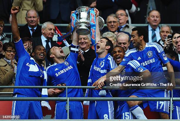 Didier Drogba, John Terry, Frank Lampard, Florent Malouda and Jose Bosingwa of Chelsea celebrate as they lift the FA Cup trophy during the FA Cup...