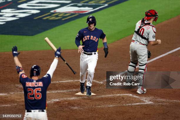 Alex Bregman of the Houston Astros runs home after a RBI single hit by Christian Vazquez of the Houston Astros during the sixth inning against the...