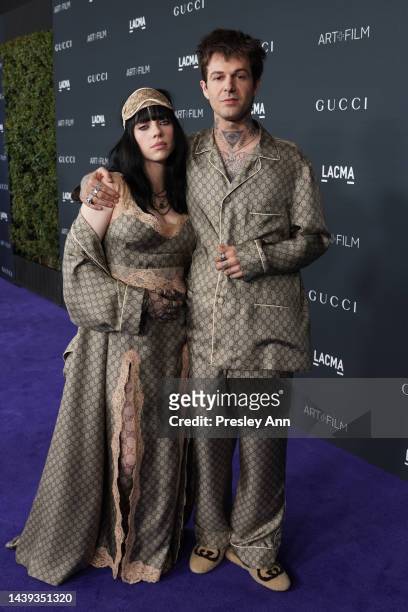 Billie Eilish and Jesse Rutherford, both wearing Gucci, attend the 2022 LACMA ART+FILM GALA Presented By Gucci at Los Angeles County Museum of Art on...