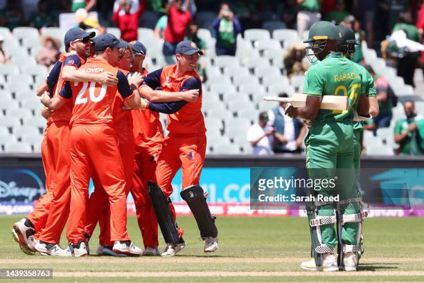 Netherlands players celebrate the win during the ICC Men's T20 World Cup match between South Africa and Netherlands at Adelaide Oval on November 06,...