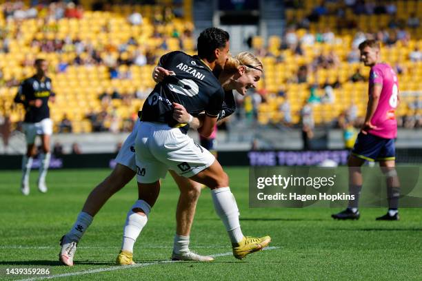 Lachlan Rose of Macarthur FC celebrates with Daniel Arzani after scoring a goal during the round five A-League Men's match between Wellington Phoenix...