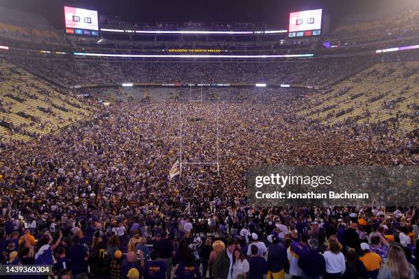 Fans storm the field to celebrate their win against the Alabama Crimson Tide at Tiger Stadium on November 05, 2022 in Baton Rouge, Louisiana.