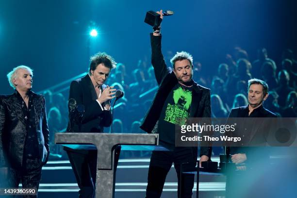 Inductees Nick Rhodes, John Taylor, Roger Taylor and Simon Le Bon of Duran Duran speak onstage during the 37th Annual Rock & Roll Hall of Fame...
