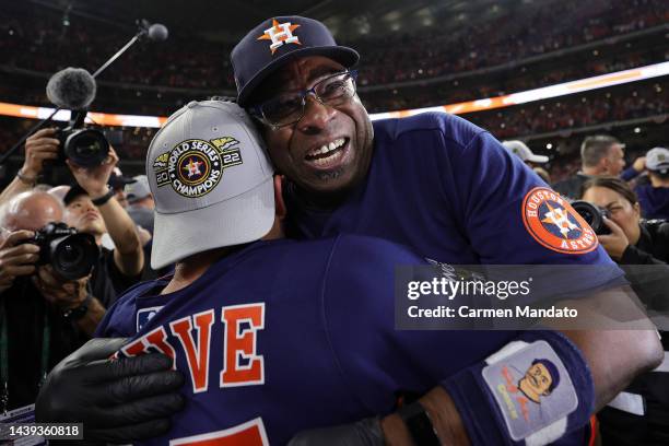 Manager Dusty Baker Jr. And Jose Altuve of the Houston Astros celebrate after defeating the Philadelphia Phillies 4-1 to win the 2022 World Series in...