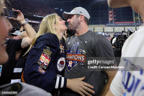 Justin Verlander of the Houston Astros embraces his wife Kate Upton after defeating the Philadelphia Phillies 4-1 to win the 2022 World Series in...