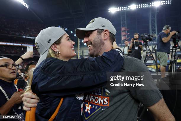 Justin Verlander of the Houston Astros embraces his wife Kate Upton after defeating the Philadelphia Phillies 4-1 to win the 2022 World Series in...