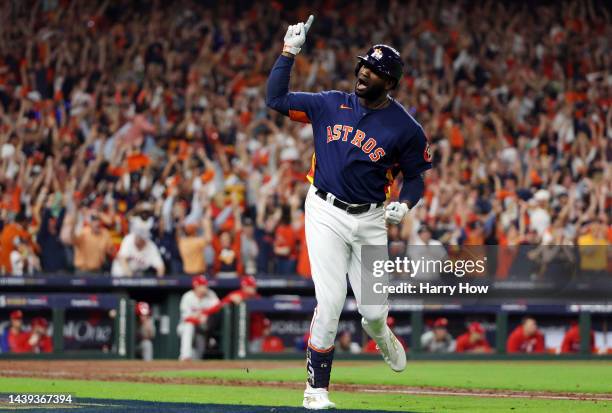 Yordan Alvarez of the Houston Astros celebrates after hitting a three-run home run against the Philadelphia Phillies during the sixth inning in Game...