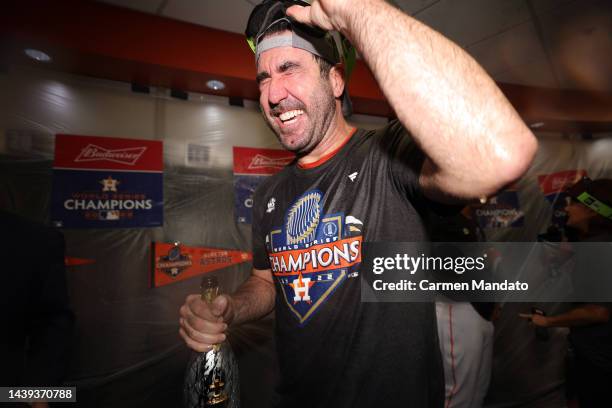 Justin Verlander of the Houston Astros celebrates in the clubhouse after defeating the Philadelphia Phillies 4-1 to win the 2022 World Series in Game...