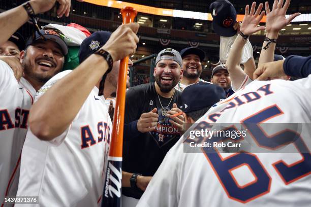 Jose Urquidy of the Houston Astros celebrates with friends and family after defeating the Philadelphia Phillies 4-1 to win the 2022 World Series in...