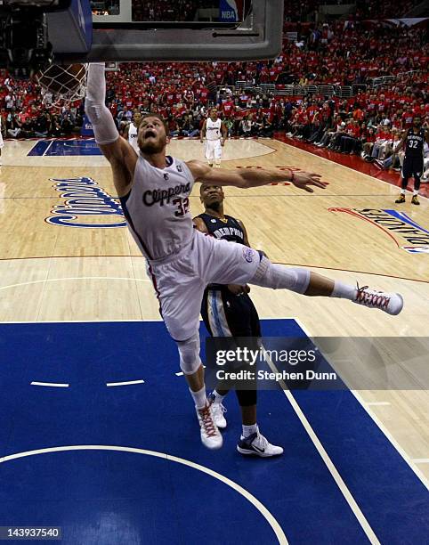 Blake Griffin of the Los Angeles Clippers dunks to beat the buzzer ending the first half against the Memphis Grizzlies in Game Three of the Western...