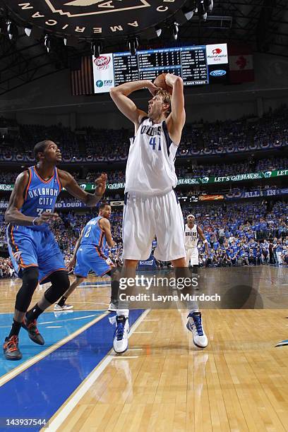 Dirk Nowitzki of the Dallas Mavericks looks to shoot over Kevin Durant of the Oklahoma City Thunder during the game between the Dallas Mavericks and...