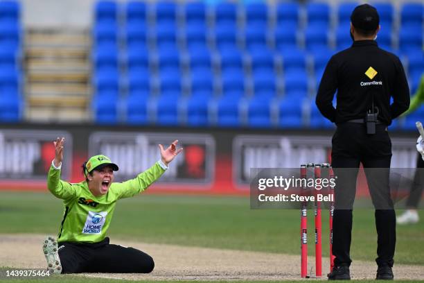 Lauren Smith of the Thunder appeals for the wicket of Josie Dooley of the Renegades during the Women's Big Bash League match between the Melbourne...