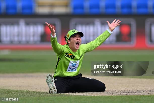 Lauren Smith of the Thunder appealseals for the wicket of Josie Dooley of the Renegades during the Women's Big Bash League match between the...