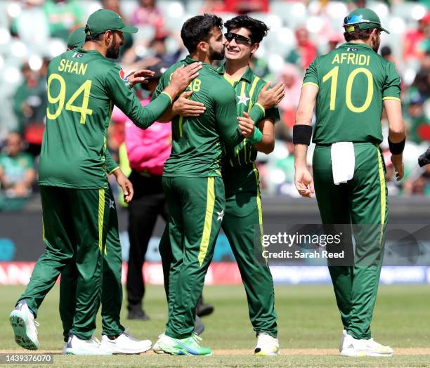 Shadab Khan of Pakistan surrounded by team mates after getting the wicket of Shakib Al Hasan of Bangladesh LBW for a duck during the ICC Men's T20...