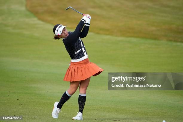 Kana Nagai of Japan hits her third shot on the 18th hole during the final round of the TOTO Japan Classic at Seta Golf Course North Course on...