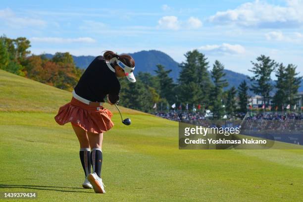 Kana Nagai of Japan hits her second shot on the 18th hole during the final round of the TOTO Japan Classic at Seta Golf Course North Course on...