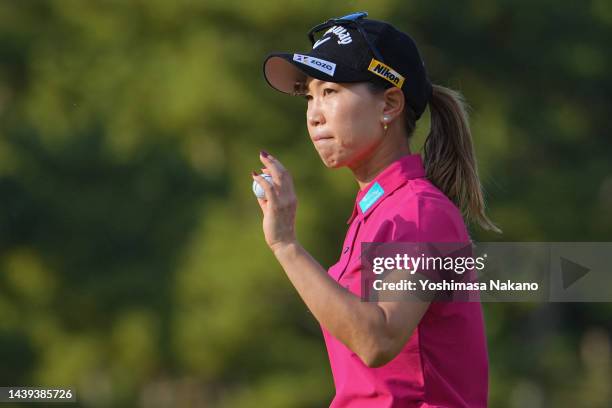 Momoko Ueda of Japan acknowledges the gallery after holing out on the 18th green during the final round of the TOTO Japan Classic at Seta Golf Course...