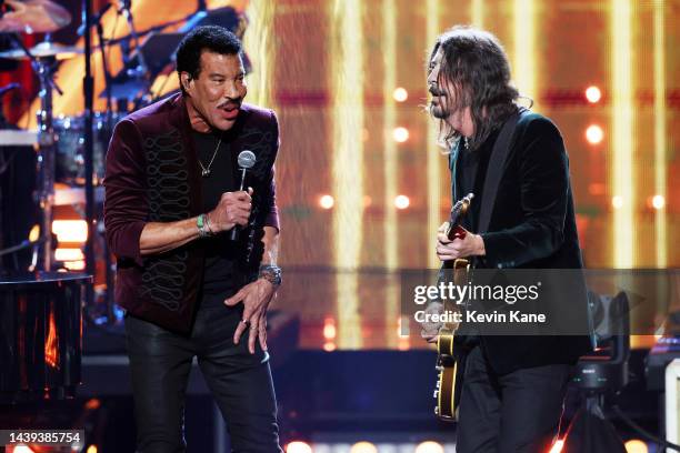 Inductee Lionel Richie and Dave Grohl perform onstage during the 37th Annual Rock & Roll Hall of Fame Induction Ceremony at Microsoft Theater on...