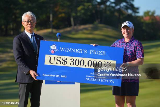 Gemma Dryburgh of Scotland is presented the winner's check at the award ceremony following the final round of the TOTO Japan Classic at Seta Golf...