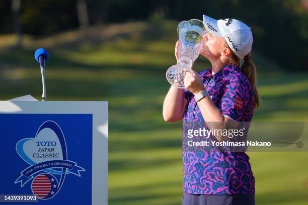Gemma Dryburgh of Scotland kisses the trophy at the award ceremony following the final round of the TOTO Japan Classic at Seta Golf Course North...