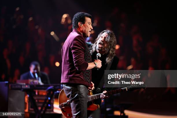 Inductee Lionel Richie and Dave Grohl perform onstage during the 37th Annual Rock & Roll Hall of Fame Induction Ceremony at Microsoft Theater on...