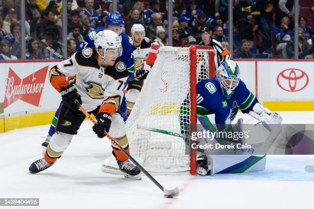 Spencer Martin of the Vancouver Canucks watches Frank Vatrano of the Anaheim Ducks skate with the puck during the second period of their NHL game at...