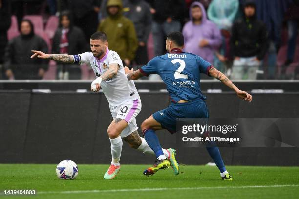 Dylan Bronn of US Salernitana and Cristian Buonaiuto of US Cremonese in action during the Serie A match between US Salernitana and US Cremonese at...