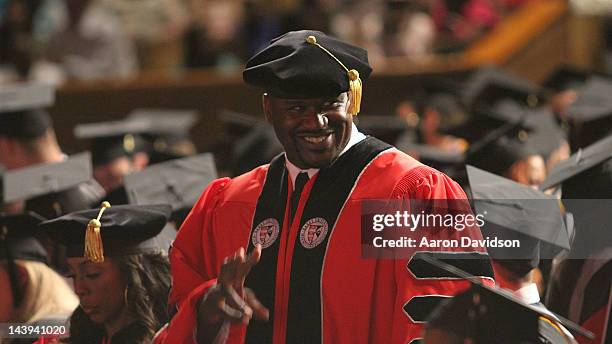 Shaquille O'Neal receives his doctoral degree in education from Barry University at James L. Knight Center on May 5, 2012 in Miami, Florida.