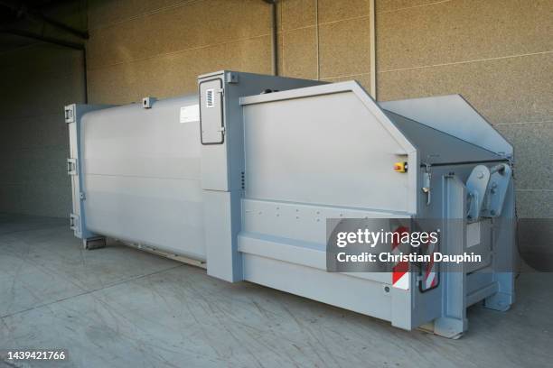 waste compactor - pressmaschine stock-fotos und bilder