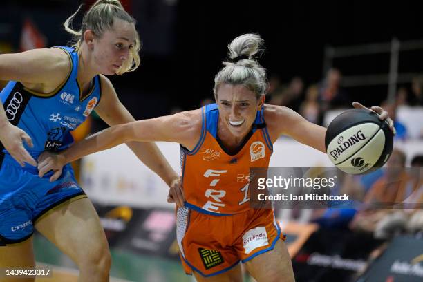 Lauren Nicholson of the Fire drives to the basket during the round one WNBL match between Townsville Fire and UC Capitals at Townsville Entertainment...