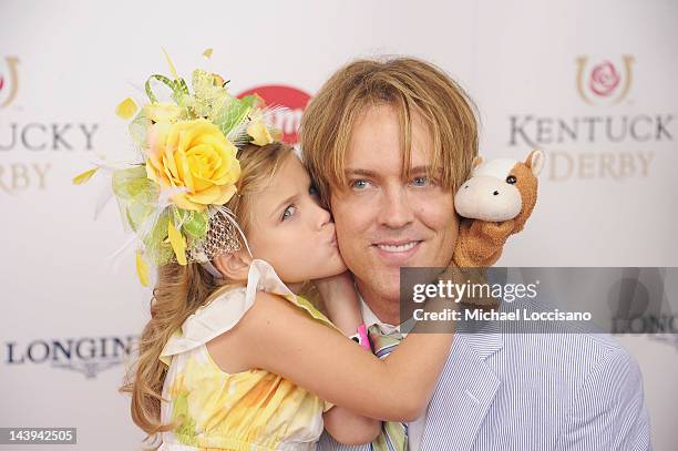 Dannielynn Birkhead and her father Larry Birkhead attend the 138th Kentucky Derby at Churchill Downs on May 5, 2012 in Louisville, Kentucky.