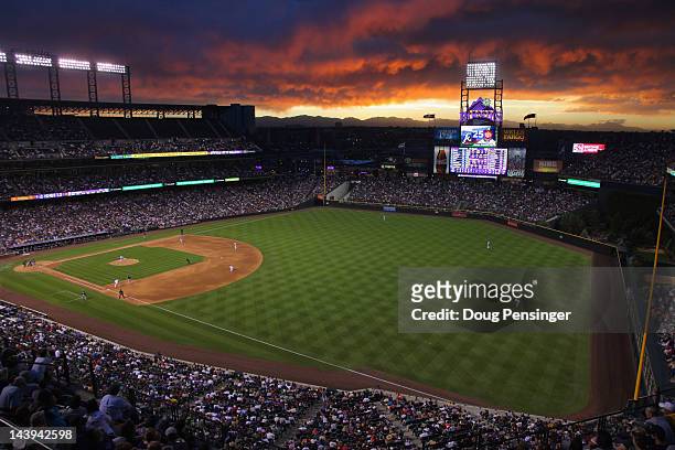 Sunset falls over the stadium as the Atlanta Braves face the Colorado Rockies at Coors Field on May 5, 2012 in Denver, Colorado.