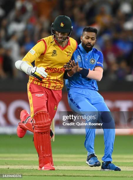 Craig Ervine of Zimbabwe and Hardik Pandya of India run into each other during the ICC Men's T20 World Cup match between India and Zimbabwe at...